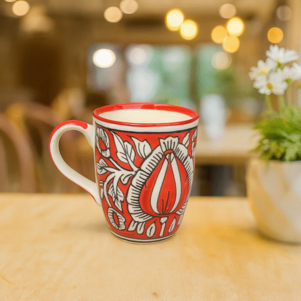 Red ceramic coffee cup with elegant rounded design